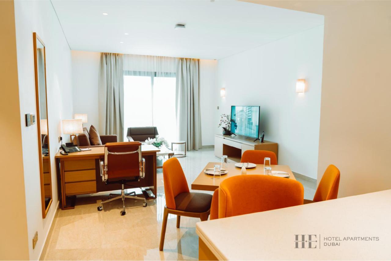 HE Hotel Apartments Dubai Zimmer foto A living room at the hotel