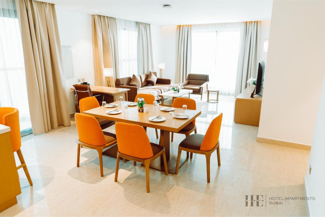 HE Hotel Apartments Dubai Zimmer foto A living room at the hotel
