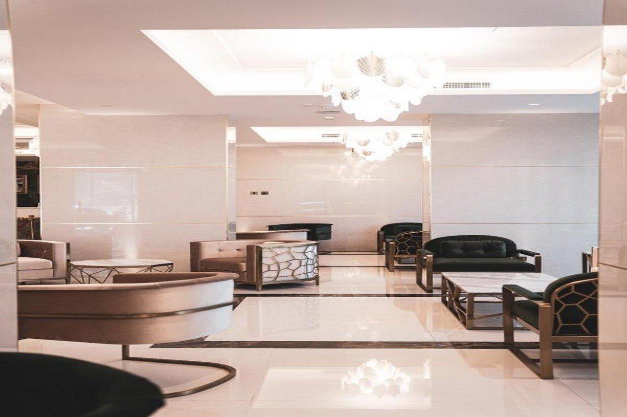 HE Hotel Apartments Dubai Exterior foto Lobby